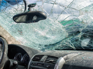 A car windshield is broken